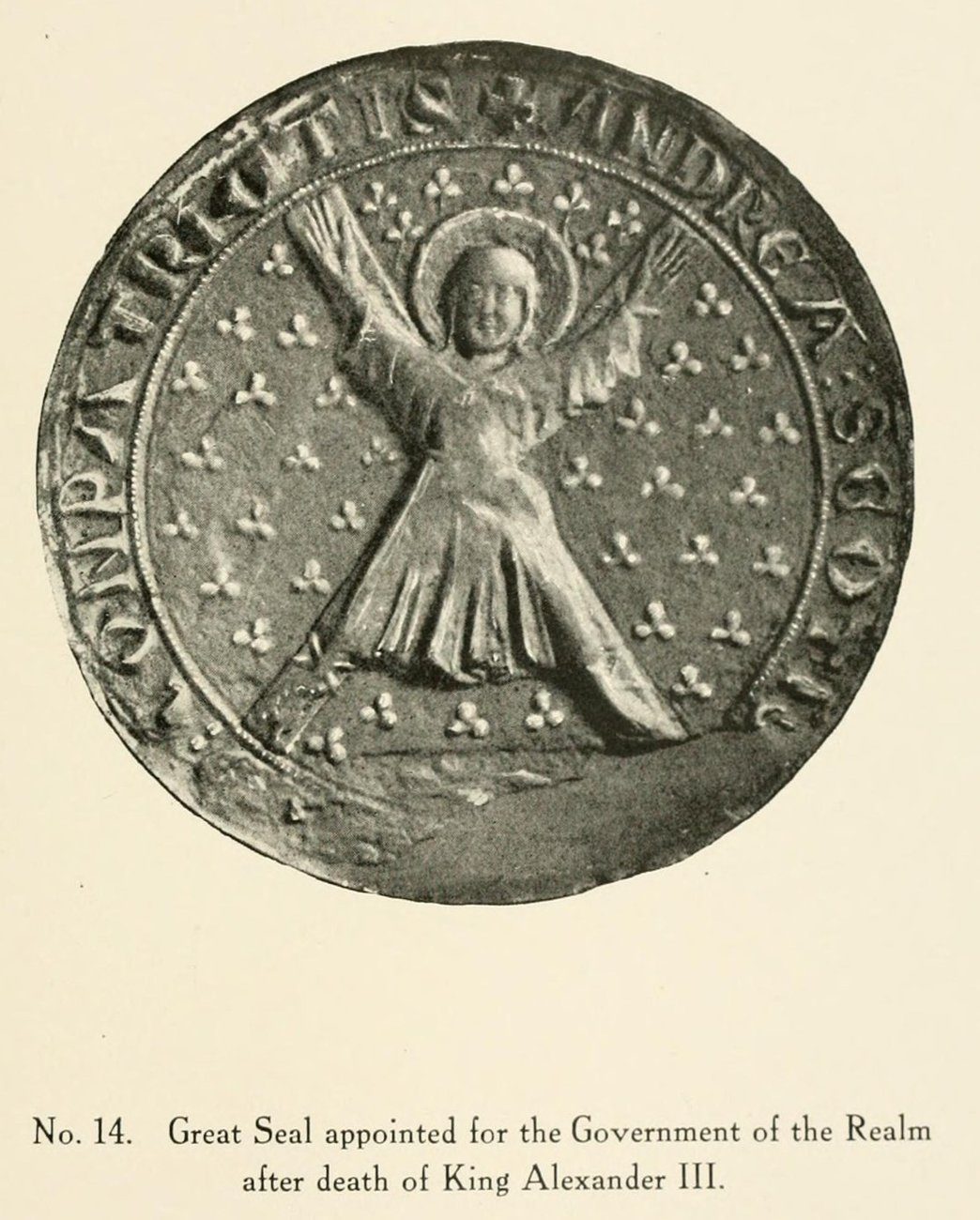 A photograph of a round medieval wax seal showing St Andrew on his diagonal cross, with a Latin inscription around the edge and a printed caption below